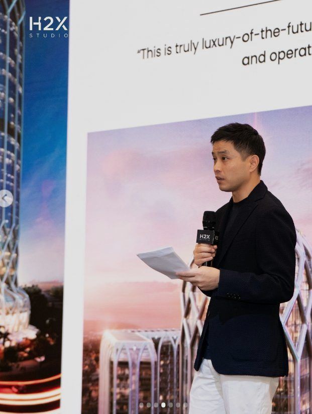 A speaker presenting on stage